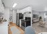 kitchen with stainless-steel appliances and wood flooring