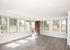 spacious living area with wood style flooring