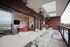 Rooftop deck with seating and fireplace