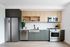 2 BR Apartments in Woodstock, Portland, OR- NOVUS - Open Kitchen With Stainless Steel Appliances, Built-In Microwave, Wood-Inspired Cabinets, And Luxury Vinyl Plank Flooring.