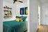 3 BR Apartments in Woodstock, Portland, OR - NOVUS - Bedroom With Sliding Door, Ceiling Fan, And Luxury Vinyl Plank Flooring.