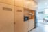 galley kitchen with birch wood cabinets at artisan
