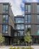 exterior front of 4 story artisan apartment building