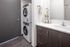 bathroom and stacked laundry at Parallax apartments