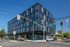 cross streets and exterior of 4 story parallax apartments building