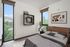 bedroom with queen size bed and two windows