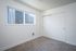 bedroom with carpet and closet
