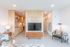 Living room into kitchen and bedroom
