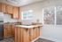 Kitchen with wood cabinets