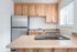 Kitchen with wood cabinets