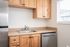 Kitchen with wood cabinets