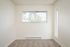 bedroom with carpet and sliding door closet