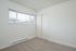 bedroom with carpet and sliding door closet