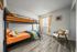 bedroom with bunkbeds and faux hardwood flooring at peoria grand apartments