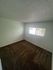 bedroom with brown carpet at the creek at south carson