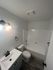 full bathroom with shower-tub combo and white vanity at the creek at south carson