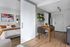 Virtually staged apartment with quartz countertops, stainless steel appliances, and lvp flooring