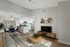 2-Bedroom Apartments in Reno, NV - Redfield Ridge - Furnished Living Room with Wood-Style Flooring, Modern Light Fixtures, a Dining Area and Kitchen