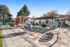 exterior lounge area with hanging chairs at redfield ridge apartments