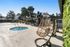 spa and exterior lounge area with hanging chairs at redfield ridge apartments