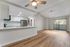 living room with wood like flooring at redfield ridge