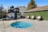 spa and exterior lounge area with hanging chairs at redfield ridge apartments