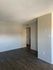 bedroom with vinyl wood like flooring at deer valley village