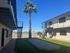 grassy courtyard in between apartment buildings at Deer Valley Village