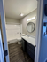 Bathroom with shower and bathtub, toilet, and sink