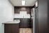 Kitchen with stainless steel appliances and Vinyl Wood Like Flooring