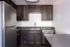 Kitchen with stainless steel appliances and Vinyl Wood Like Flooring