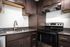 Kitchen with stainless steel appliances and Vinyl Wood Like Flooring