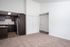 view of living room and kitchen and partial hallway