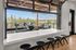open window displaying bar area in the resident lounge at the hixon