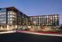 angled exterior of of the hixon apartment building displaying entire L shaped building