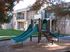 community playground and 2 story apartment building at ala moana