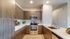 1-Bedroom Apartments In Reno, NV - Canyon's Edge - Modern Kitchen With Hardwood Cabinets, Stainless-Steel Appliances, And Wood-Inspired Flooring