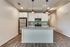 open kitchen with stainless steel appliances and floor to ceiling windows and patio door at oner midtown