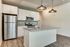 kitchen with stainless steel appliances at oner midtown
