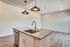 kitchen and living room with wood like flooring at oner midtown