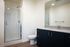 Bathroom with shower, sink, and toilet