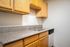Kitchen with granite countertops and stainless steel sink