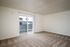 Spacious room with walkout patio