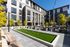 Outdoor community patio with bocce court at Henley Place
