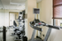 fitness center with treadmills and elipticals