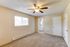 Bedroom with carpeted floors