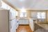 Full kitchen with fridge, oven and sink
