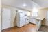 Full kitchen with fridge, oven and sink