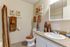 Bahtroom with sink, shower, and toilet