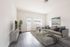 virtually staged Living Room with wood like flooring at Fernhill